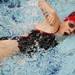 An Arkansas swimmer competes in a freestyle event at Canham Natatorium during the AAU Junior Olympics on Monday, July 29. Daniel Brenner I AnnArbor.com